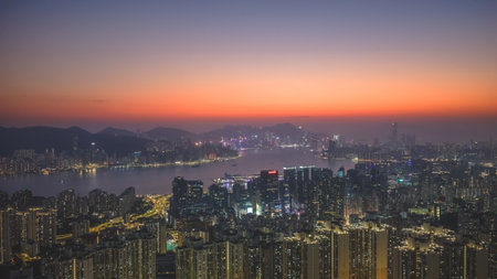 Soft evening light blankets cityscape viewed from Tai Sheung Tok Jan 18 2026のeditorial素材