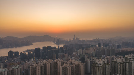 Soft evening light blankets cityscape viewed from Tai Sheung Tok Jan 18 2026のeditorial素材