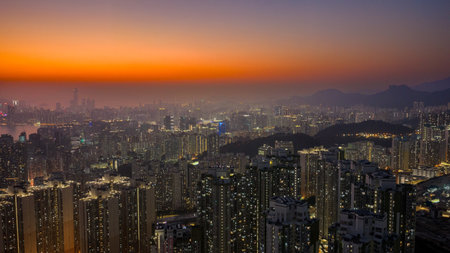 Soft evening colors illuminate dense urban landscape of Kowloon Jan 18 2026のeditorial素材