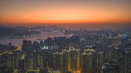 Soft evening colors illuminate dense urban landscape of Kowloon Jan 18 2026のeditorial素材