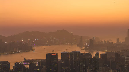 Soft evening light blankets cityscape viewed from Tai Sheung Tok Jan 18 2026のeditorial素材