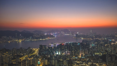 Soft evening light blankets cityscape viewed from Tai Sheung Tok Jan 18 2026のeditorial素材