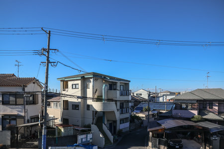 Capturing Osaka Prefecture Landscapes from HARUKA Train Window Nov 29 2025のeditorial素材