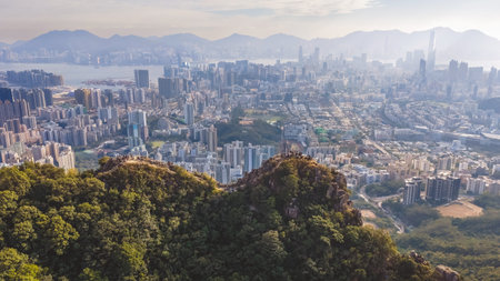 Famous mountain ridge rises above dense urban skyline Jan 25 2026のeditorial素材