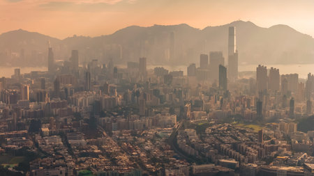 Layered urban towers soften gradually beneath atmospheric distant peaks Jan 25 2026
