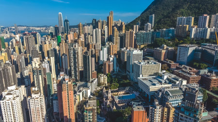 Sunlit high rise towers rise above bright harbour panorama Feb 14 2026のeditorial素材