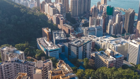 Glass corporate buildings stand prominently within vibrant commercial hub Feb 14 2026のeditorial素材