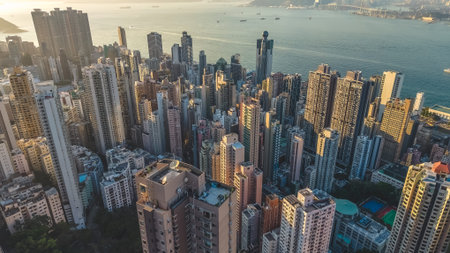 Sunlit high rise towers rise above bright harbour panorama Feb 14 2026のeditorial素材