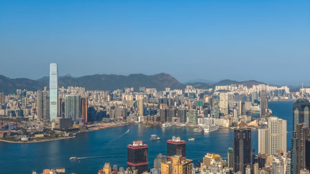 Glittering waterfront divides dense skyscrapers across vibrant cityscape Feb 14 2026