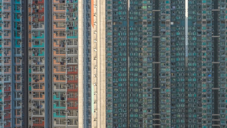 Layered high rise facades form colorful repeating architectural textures Feb 15 2026のeditorial素材