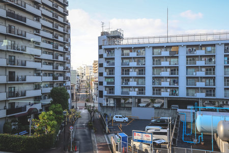 Urban neighborhood with apartments and local community life Nov 25 2025のeditorial素材