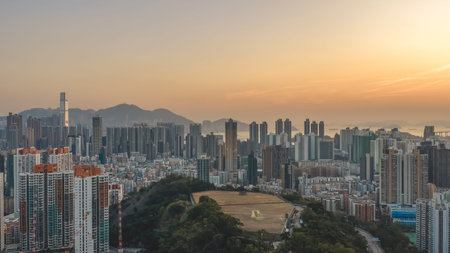 Warm evening light illuminates dense high rise cityscape Feb 13 2026のeditorial素材