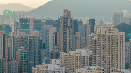 Layered residential towers stand before dense illuminated city backdrop Feb 13 2026
