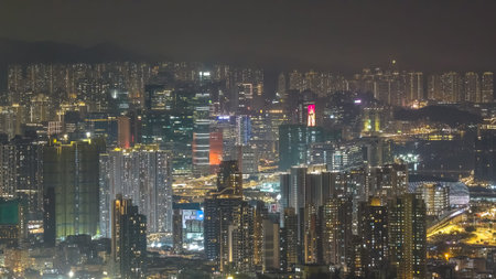 Illuminated residential clusters form vast layered nighttime urban panorama Feb 13 2026のeditorial素材