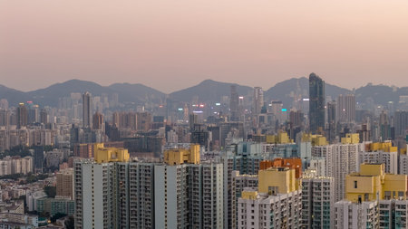 Layered residential towers stand before dense illuminated city backdrop Feb 13 2026のeditorial素材