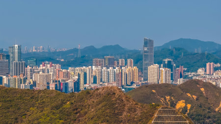 Contemporary urban skyline showcasing dense skyscrapers under clear daylight Feb 18 2026