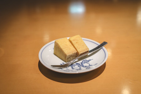 A simple dining scene shows two sponge cakes o Nov 28 2025