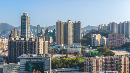 buildings cluster around hillside forming compact urban landscape March 14 2026