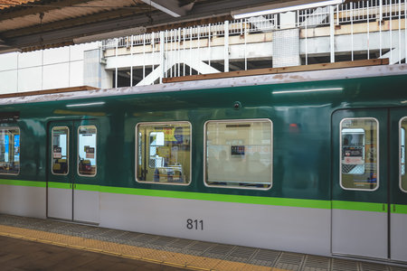 Urban railway scene featuring train at station platform in Japan Nov 27 2025のeditorial素材