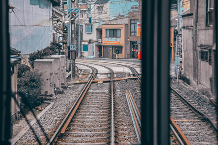 train cab shows tracks curving ahead through calm countryside Nov 27 2025のeditorial素材
