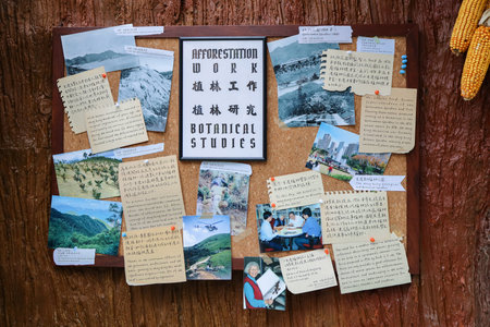 Informative exhibition board showcasing afforestation projects and initiatives March 21 2026のeditorial素材