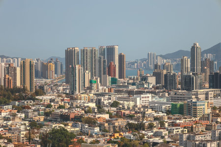 March 18 2026 High density cityscape with residential towers and distant hillsのeditorial素材
