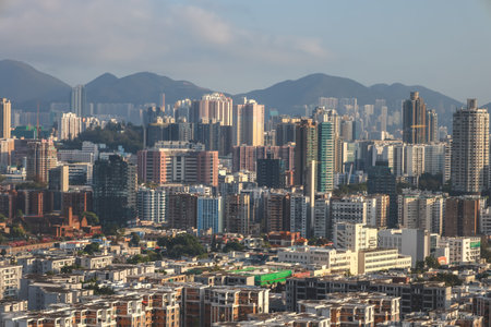 March 18 2026 High density cityscape with residential towers and distant hillsのeditorial素材