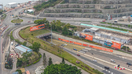 March 27 2026 roadway curves around terraced hillside transport structures