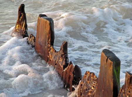 a barrier breaking the force of wavesの写真素材