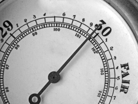 barometer with needle pointing towards fair weatherの写真素材