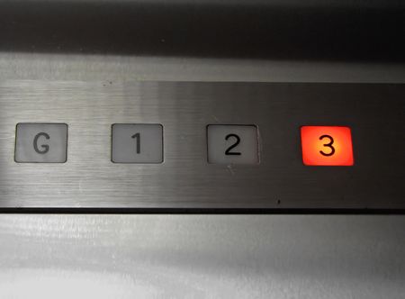 inside of old elevator number 3 floor pushed