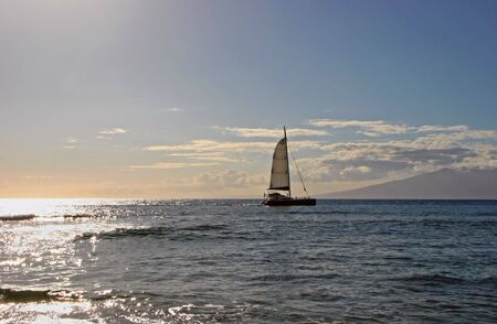 sailboat on beautiful Maui Hawaiian Island oceanの写真素材