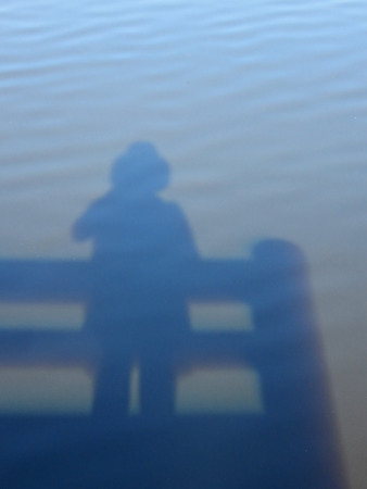 Shadow of Person in Water on Observation Deckの写真素材
