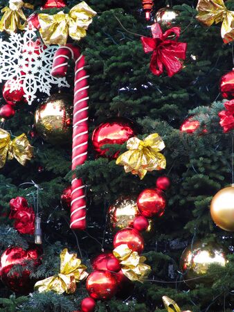 beautiful decorated Christmas tree with colorful ornamentsの写真素材