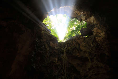 Light streams down from hole ,Khao Luang Cave 