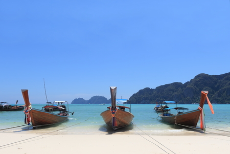 Long tail  boat and tropical beach on Phi Phi island Thailandの写真素材