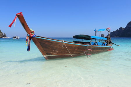 Long tail boat and tropical beach on Phi Phi island Thailandの写真素材