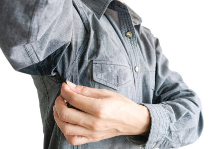 Men wear white sleeves, arms are covered with armpits, they are unclean and unclean.の写真素材