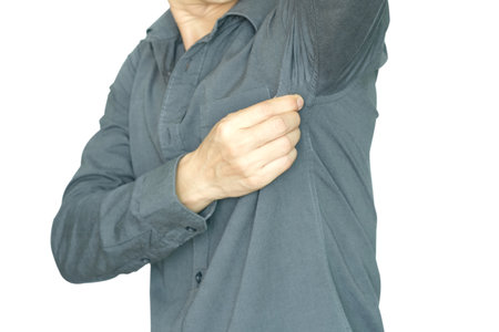 Men wear white sleeves, arms are covered with armpits, they are unclean and unclean.の写真素材