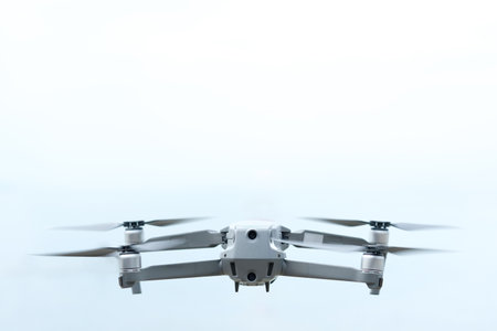 Aerial equipment Drone with Digital Camera on the White and blue Background .Technology conceptの写真素材