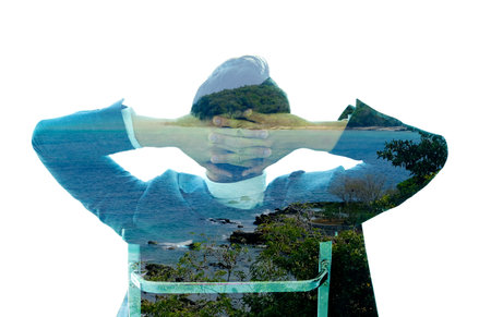 Double exposure Man, he relaxes look at the seaの写真素材