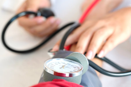 Man check blood pressure monitor and heart rate monitor with digital pressure gauge. Health care and Medical conceptの写真素材