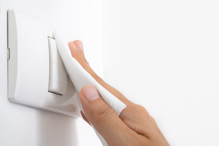 Women use clothes and antiseptics and viruses. She cleaned the switch Press on-off residential...