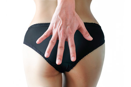 Hand of man he holding a woman's ass and legs He is being sexually abused. Background of women wearing black panties Mental health conceptsの写真素材