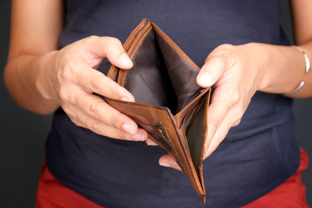 hand of man open pocket, no money in the business wallet, Financial concepts and expenditures,
