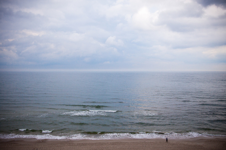 Clouds over Baltic sea surfaceの写真素材