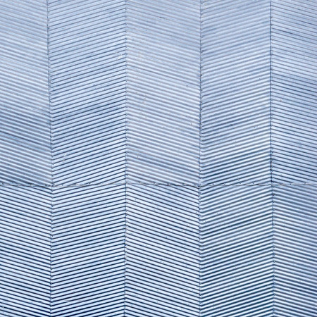 Detail of a gate made with zinc   galvanized corrugated sheet mounted with   nails on a wooden frame. Traditional   house in Transylvania.の写真素材