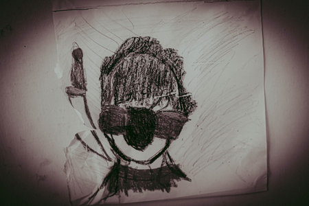 Drawing of a girl on a piece of paper. Toned.