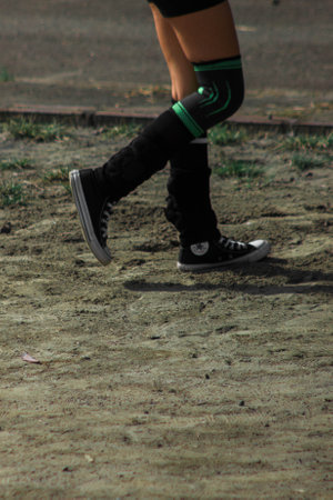 Athlete running in the park, during the day time.の写真素材