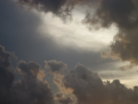 Sunset in the sky with clouds and electricity wires. Nature background.の写真素材